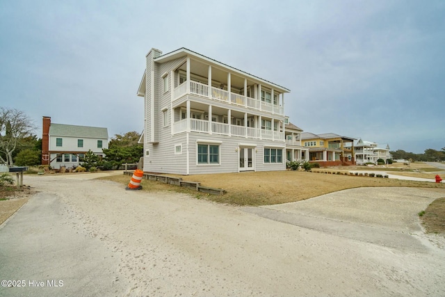 view of building exterior with driveway