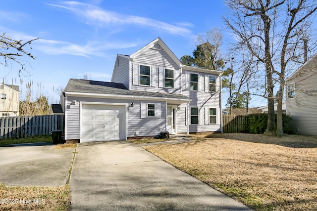 view of front facade with an attached garage, driveway, and fence