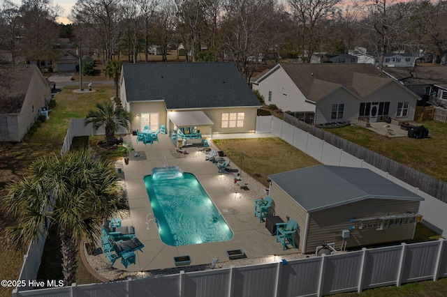 aerial view at dusk with a residential view