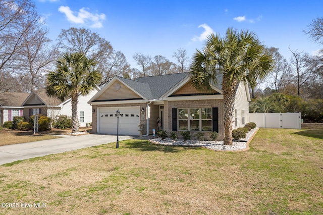 view of front of house featuring fence, an attached garage, concrete driveway, a front lawn, and brick siding