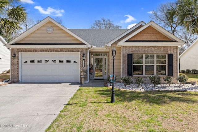 ranch-style home with brick siding, an attached garage, driveway, and a front lawn