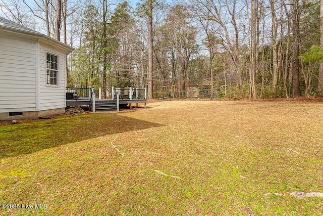 view of yard featuring a deck