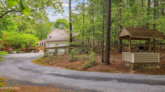exterior space featuring an attached garage and driveway