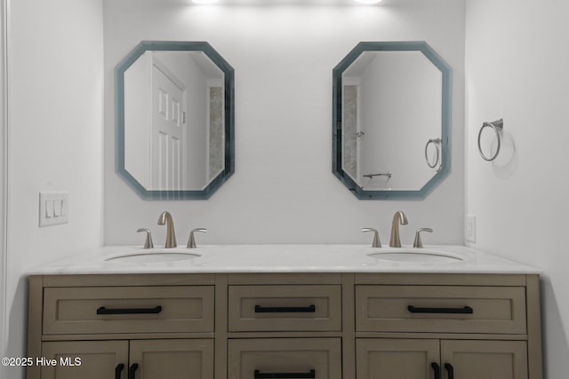 bathroom featuring double vanity and a sink