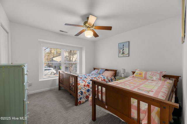 bedroom with visible vents, ceiling fan, baseboards, and carpet floors