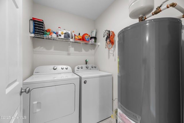 clothes washing area with laundry area and independent washer and dryer