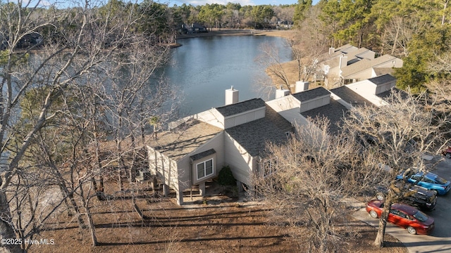 bird's eye view with a water view