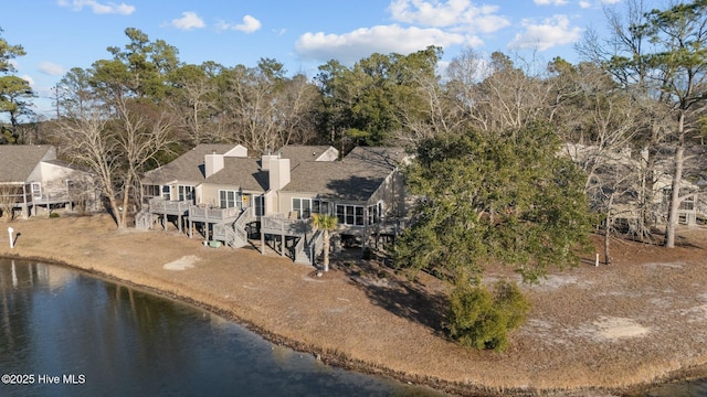 aerial view featuring a water view