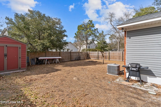 151 NE 9th St, Oak Island, NC 28465 - fenced backyard featuring central air condition unit