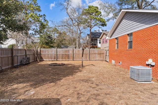151 NE 9th St, Oak Island, NC 28465 - fenced backyard with cooling unit