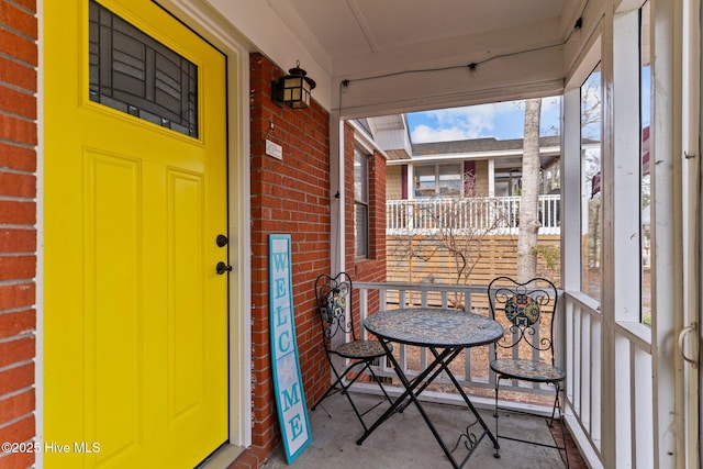 151 NE 9th St, Oak Island, NC 28465 - view of sunroom
