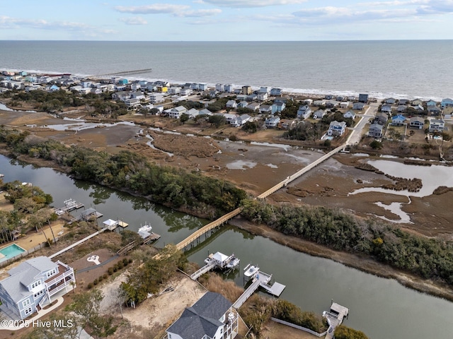151 NE 9th St, Oak Island, NC 28465 - aerial view of property and surrounding area with a large body of water