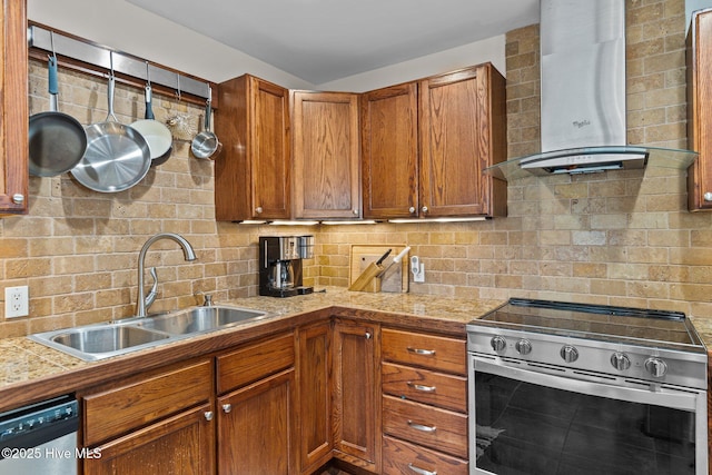 151 NE 9th St, Oak Island, NC 28465 - kitchen featuring electric range, wall chimney exhaust hood, a sink, dishwasher, and tasteful backsplash