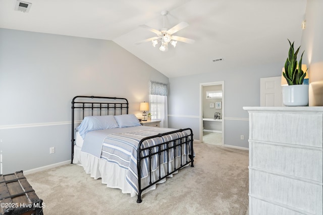 bedroom featuring carpet floors, visible vents, and vaulted ceiling