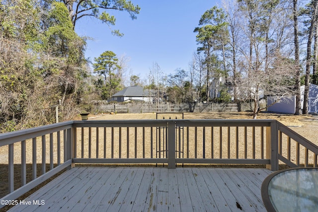 wooden deck featuring fence