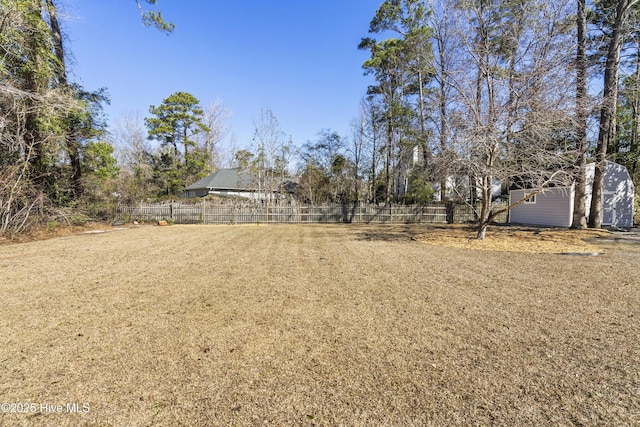 view of yard featuring fence