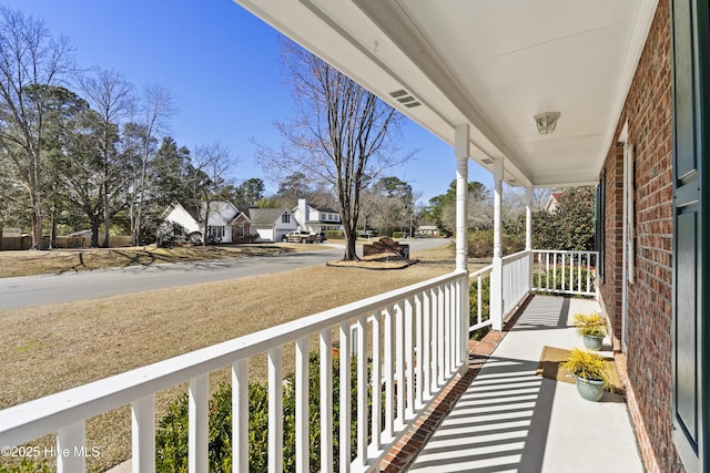 balcony featuring a porch