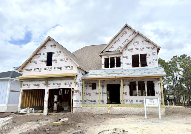 unfinished property featuring a garage