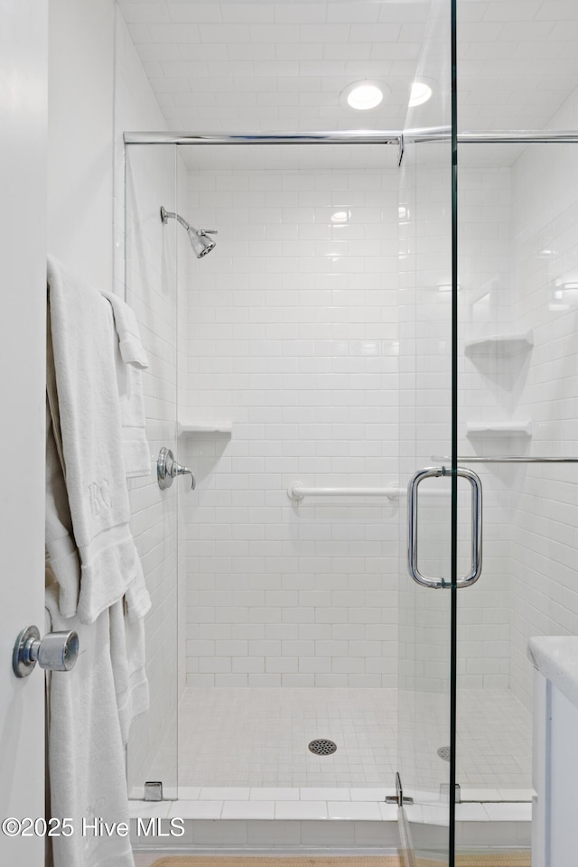 bathroom featuring a shower stall