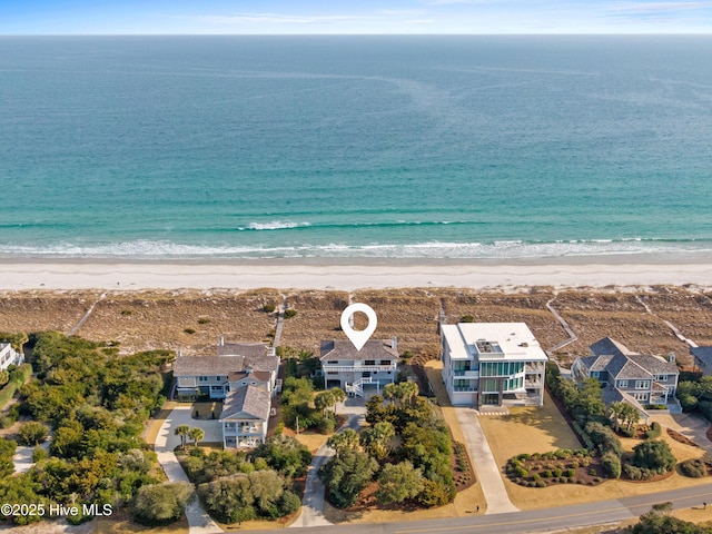 aerial view featuring a water view and a beach view