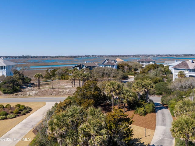 aerial view with a water view and a residential view