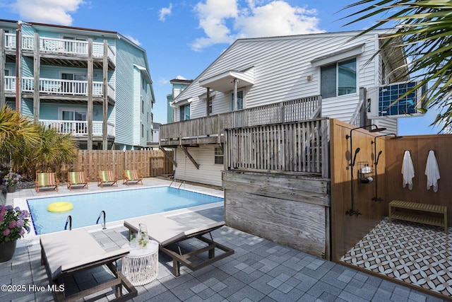 view of pool featuring a patio, a fenced in pool, and fence private yard