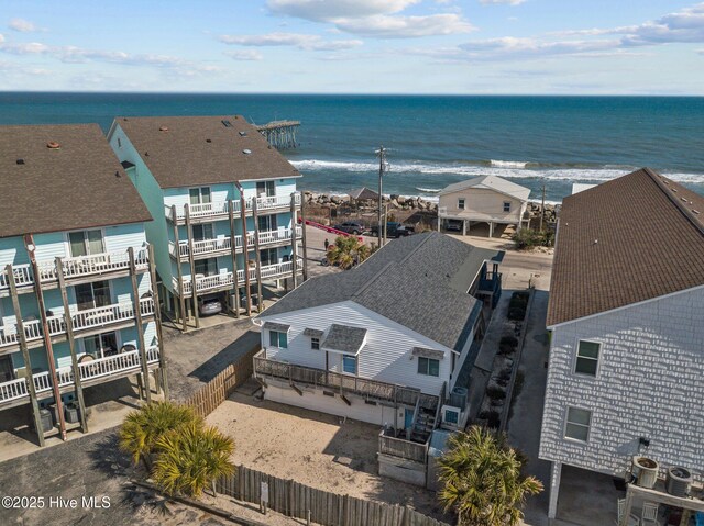 aerial view featuring a view of the beach and a water view