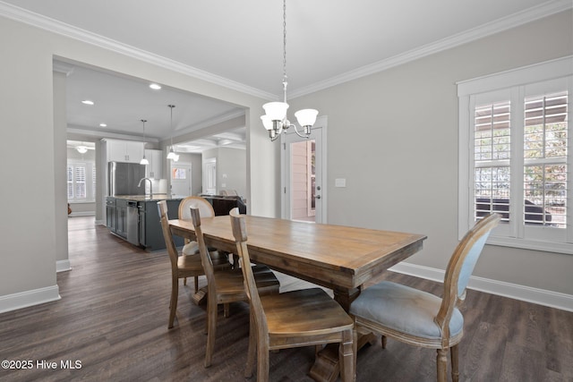 dining area with dark wood-style floors, plenty of natural light, baseboards, and ornamental molding