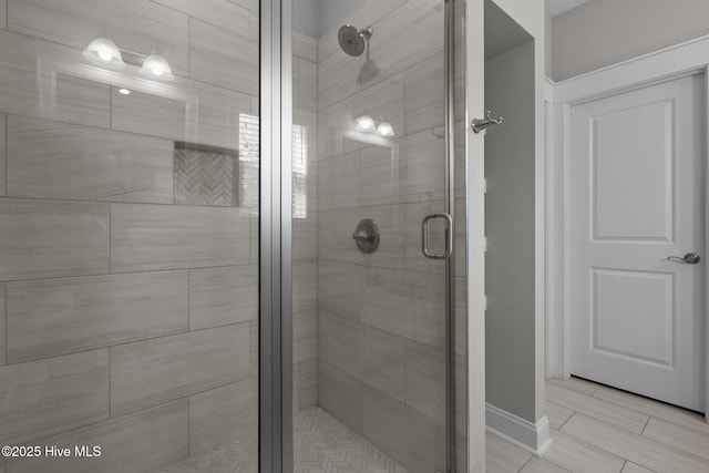 full bathroom featuring a shower stall