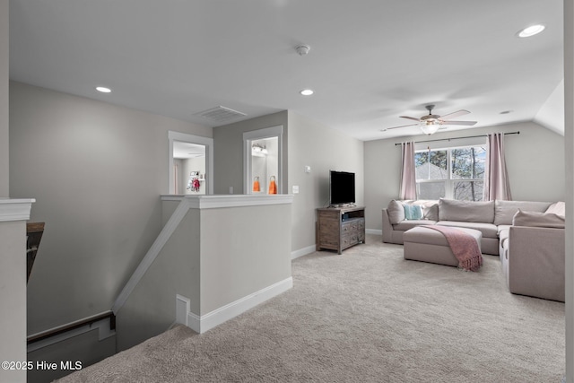 carpeted living room featuring baseboards, visible vents, a ceiling fan, vaulted ceiling, and recessed lighting