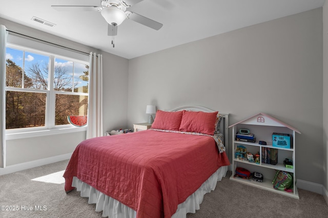 bedroom with carpet floors, visible vents, ceiling fan, and baseboards