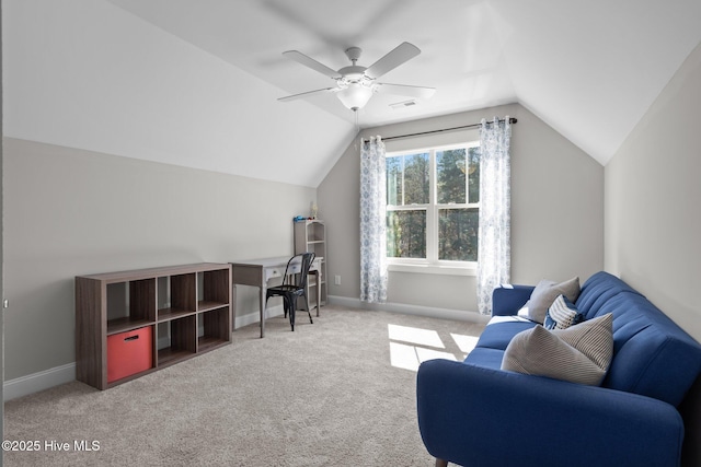 sitting room with lofted ceiling, ceiling fan, light colored carpet, visible vents, and baseboards