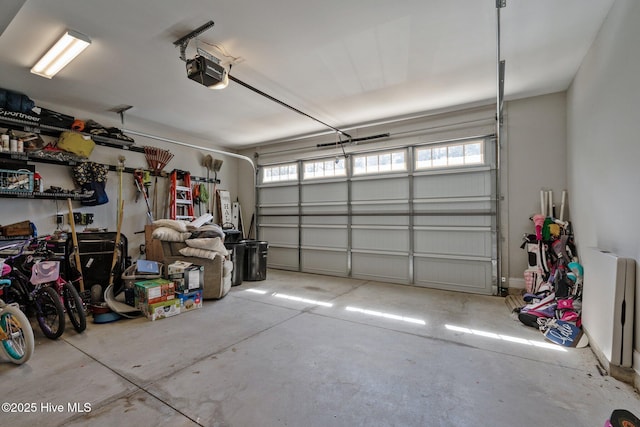 garage featuring a garage door opener