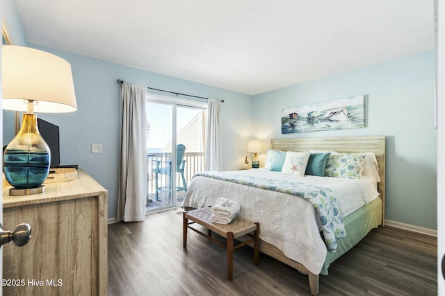 bedroom with access to outside, baseboards, and wood finished floors