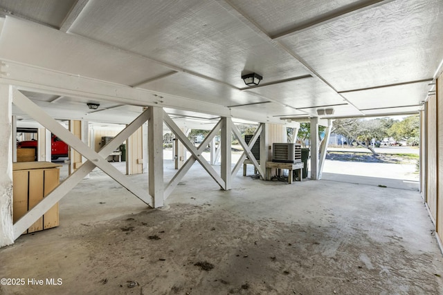 interior space with unfinished concrete floors