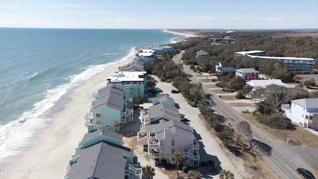 aerial view featuring a view of the beach and a water view