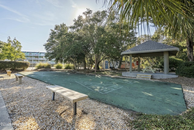 view of community featuring shuffleboard and a gazebo