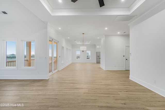 unfurnished living room featuring recessed lighting, visible vents, crown molding, and light wood finished floors