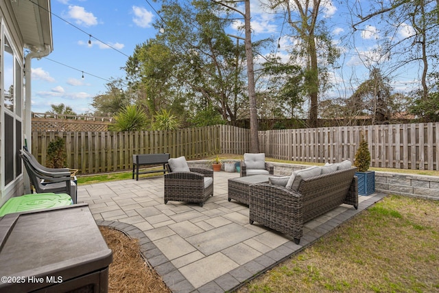 view of patio / terrace featuring a fenced backyard and an outdoor hangout area