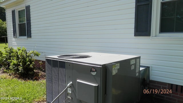 exterior details with central air condition unit