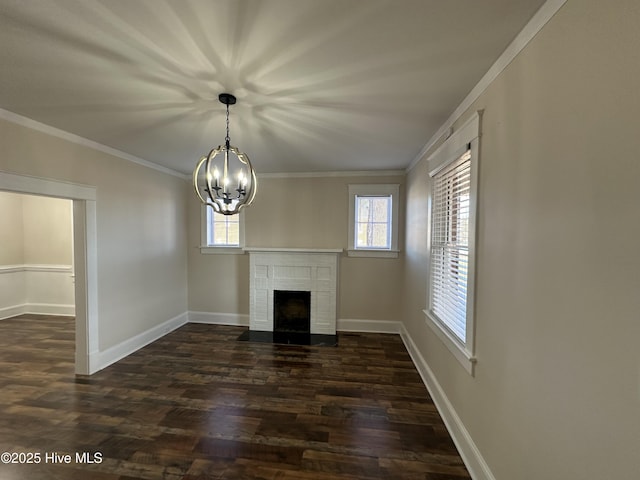 unfurnished living room featuring a brick fireplace, baseboards, and ornamental molding