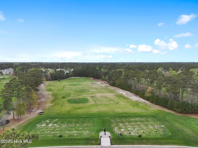 bird's eye view with view of golf course
