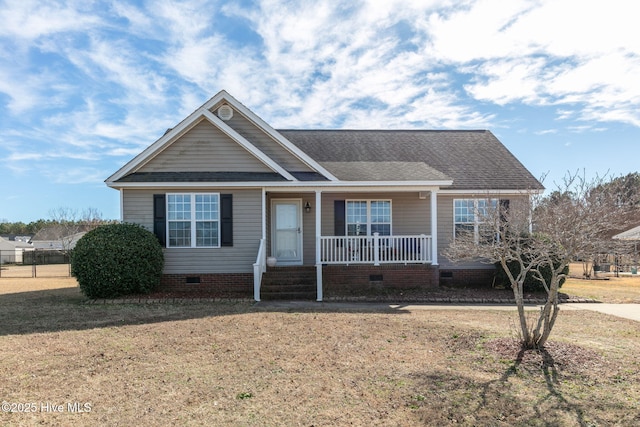 view of front of house featuring a shingled roof, a porch, a front lawn, and crawl space