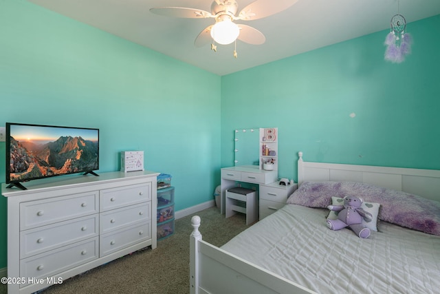 bedroom with carpet flooring, baseboards, and a ceiling fan