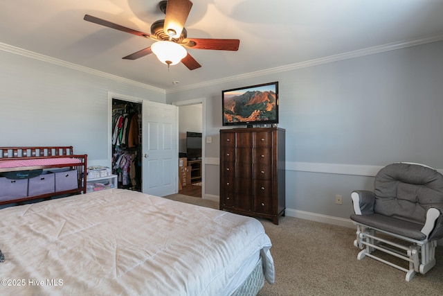 bedroom featuring a ceiling fan, carpet, baseboards, and ornamental molding