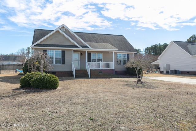 view of front of house with a porch, fence, roof with shingles, and crawl space