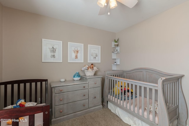 carpeted bedroom with a ceiling fan