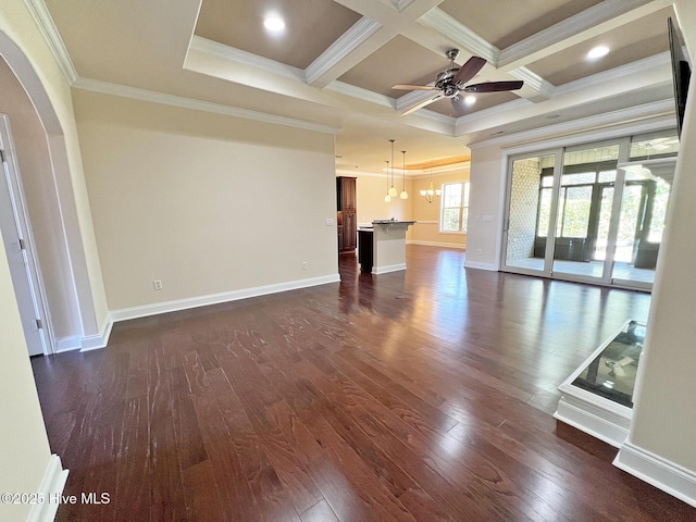 unfurnished living room with dark wood-type flooring, a ceiling fan, and arched walkways