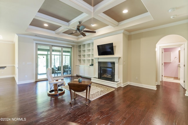 unfurnished living room featuring a glass covered fireplace, coffered ceiling, baseboards, and dark wood-style flooring