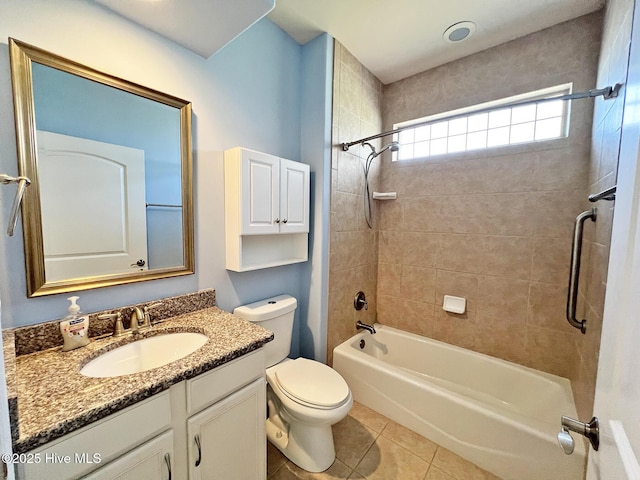 bathroom featuring vanity, toilet, bathing tub / shower combination, and tile patterned flooring